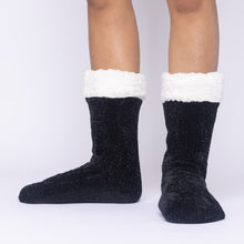Load image into Gallery viewer, The Foozie™ in Black, front view of both feet worn in Medium with the sherpa cuffs folded down