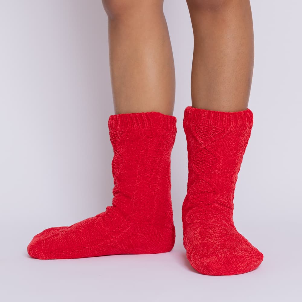 The Foozie™ Move in Red, front view of both feet showing the diamond cable knit
