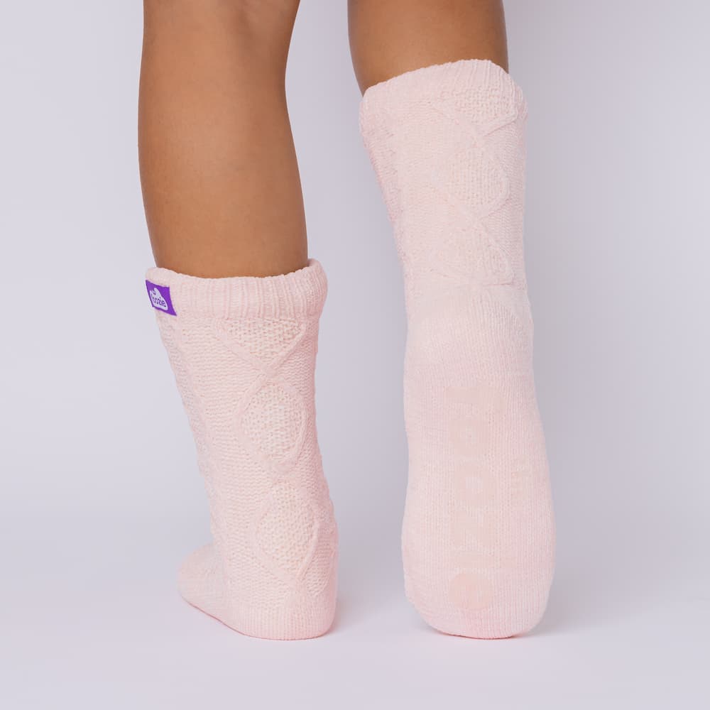 The Foozie™ Move in Pink, back view showing the diamond cable knit and the sole