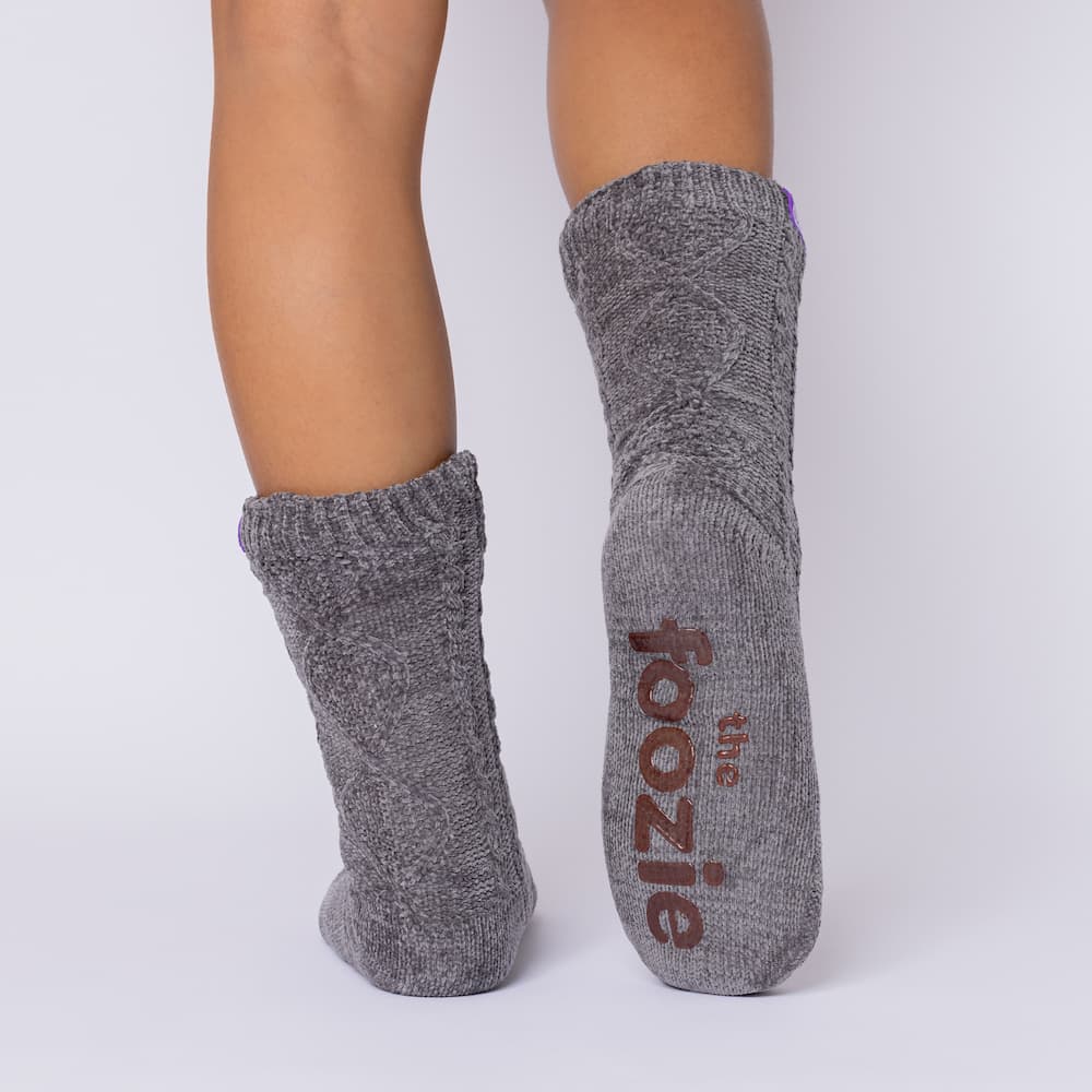 The Foozie™ Move in Dark Gray, back view showing the diamond cable knit and the foozie grips on the sole