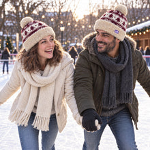 Load image into Gallery viewer, The Foozie™ Nordic Christmas Beanie, at the ice rink
