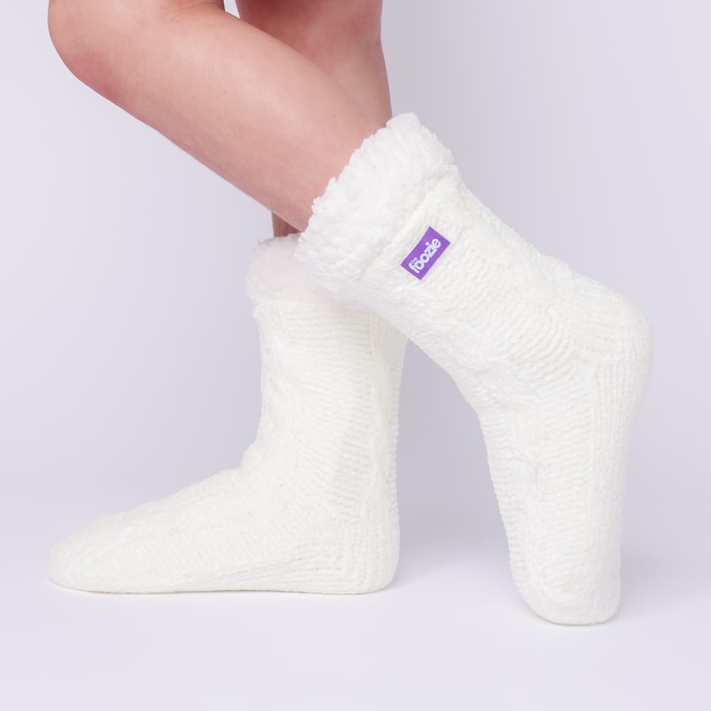 The Foozie™ in White, side view worn in Kids/Small with the sherpa cuff folded down