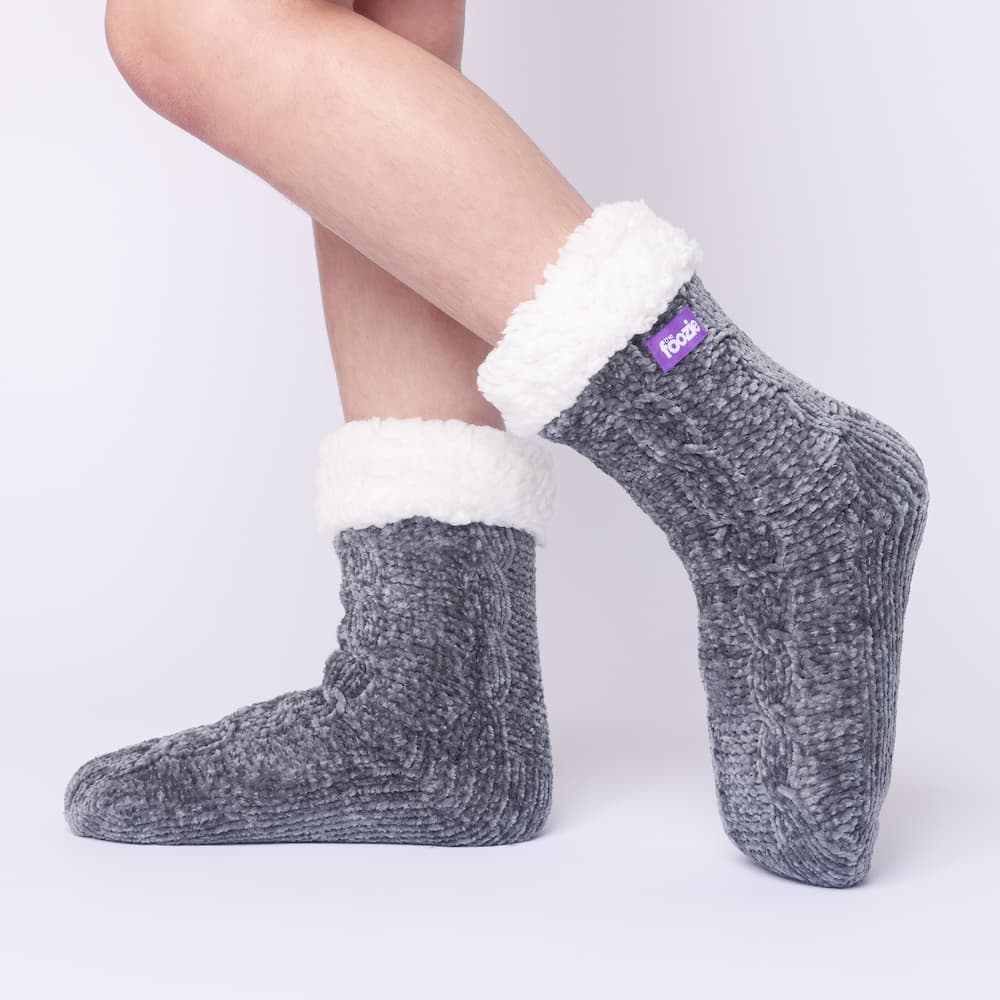 The Foozie™ in Dark Gray, side view worn in Kids/Small with the sherpa cuff folded down